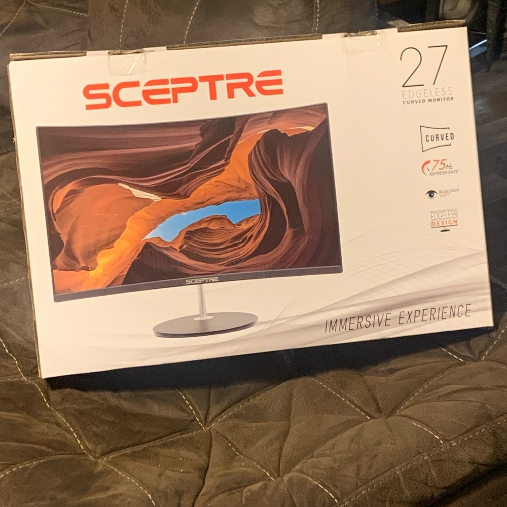 Black 27 inch Sceptre curved monitor